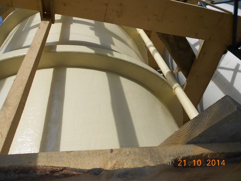 Corrosion protection of a fiberglass tank for hydrochloric acid