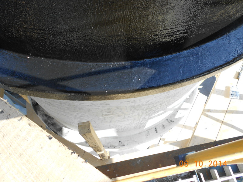 Corrosion protection of a fiberglass tank for hydrochloric acid